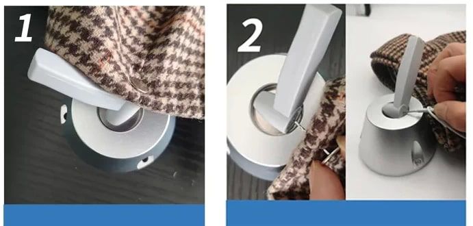 AM Hard Tag รุ่น EAS-AM-HT01 สีขาว ดีไซน์ทรงกระบอกแบบคู่ วางเอียงบนพื้นหลังสีขาวสะอาดตา สำหรับระบบป้องกันการขโมยสินค้า