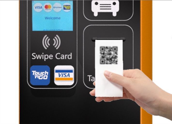 เครื่องกดกระดาษขาเข้า ลานจอดรถ